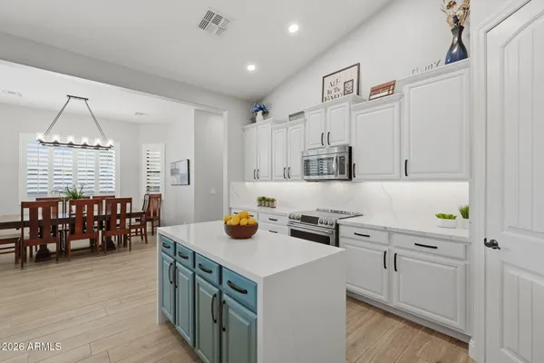 a view of swimming pool from a lounge chair