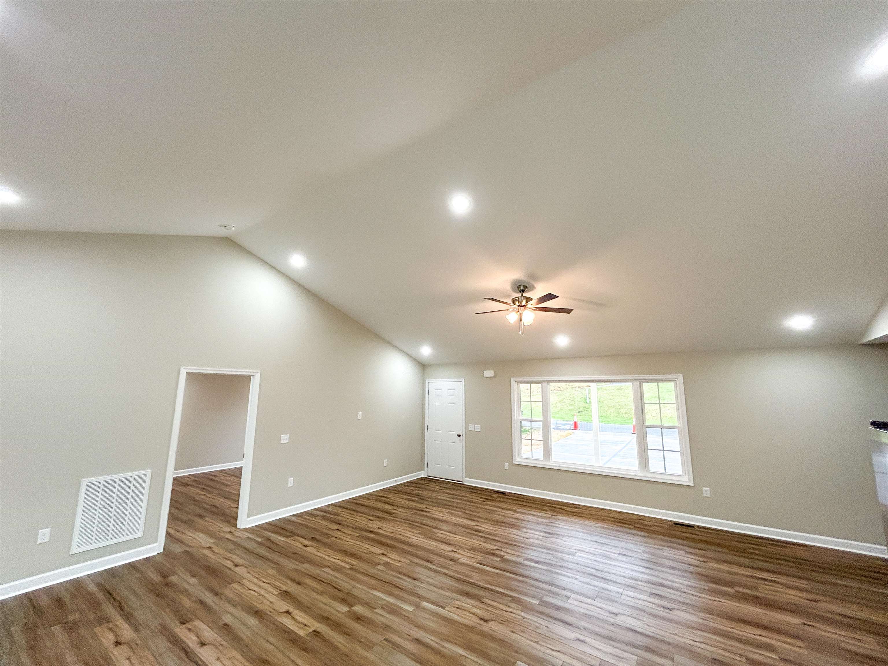 244 Locustdale Loop Shenandoah, VA 22849 - Photo 15 of 74 an empty room with wooden floor and windows