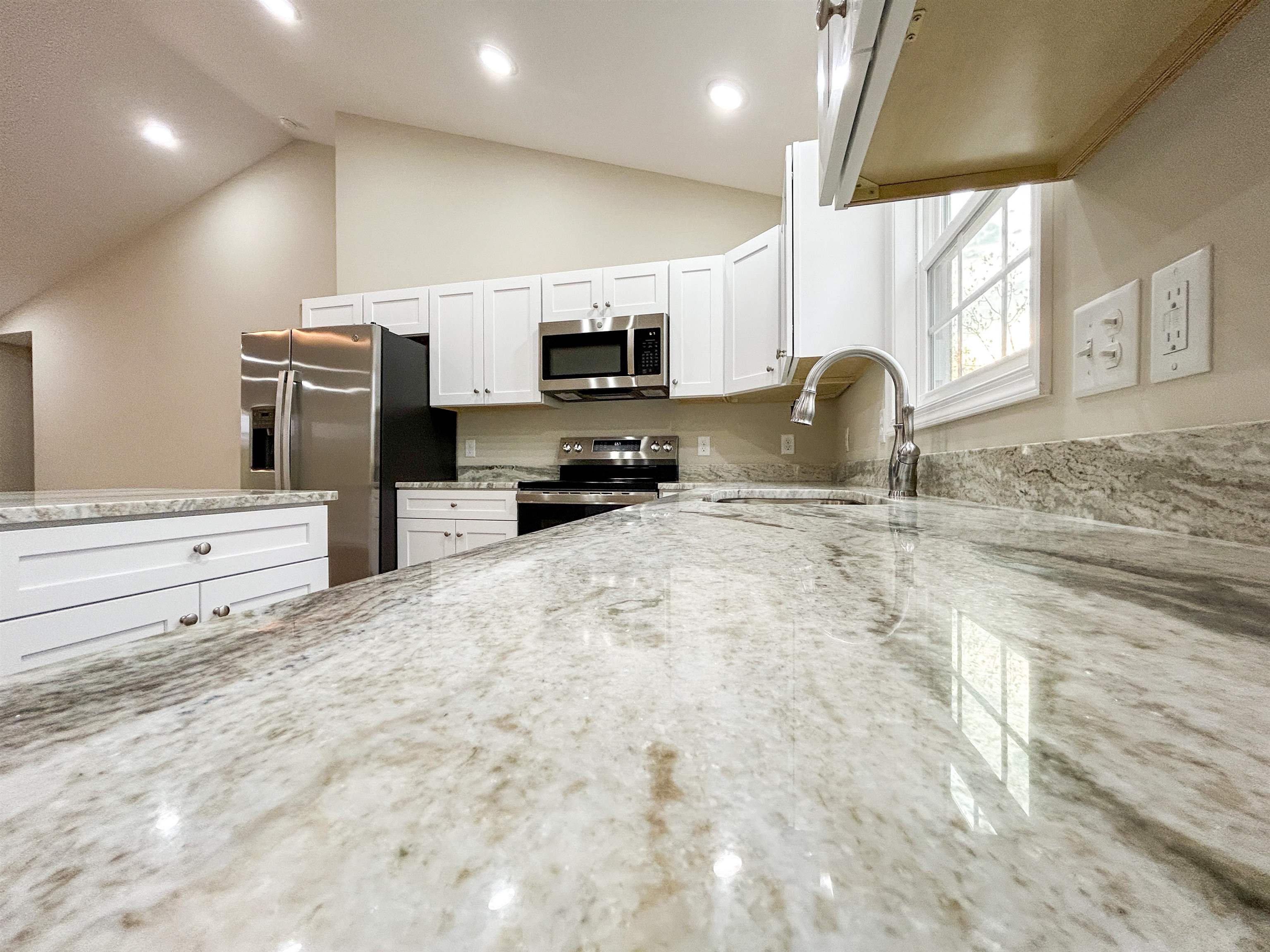 244 Locustdale Loop Shenandoah, VA 22849 - Photo 22 of 74 a kitchen with stainless steel appliances a refrigerator sink microwave and stove