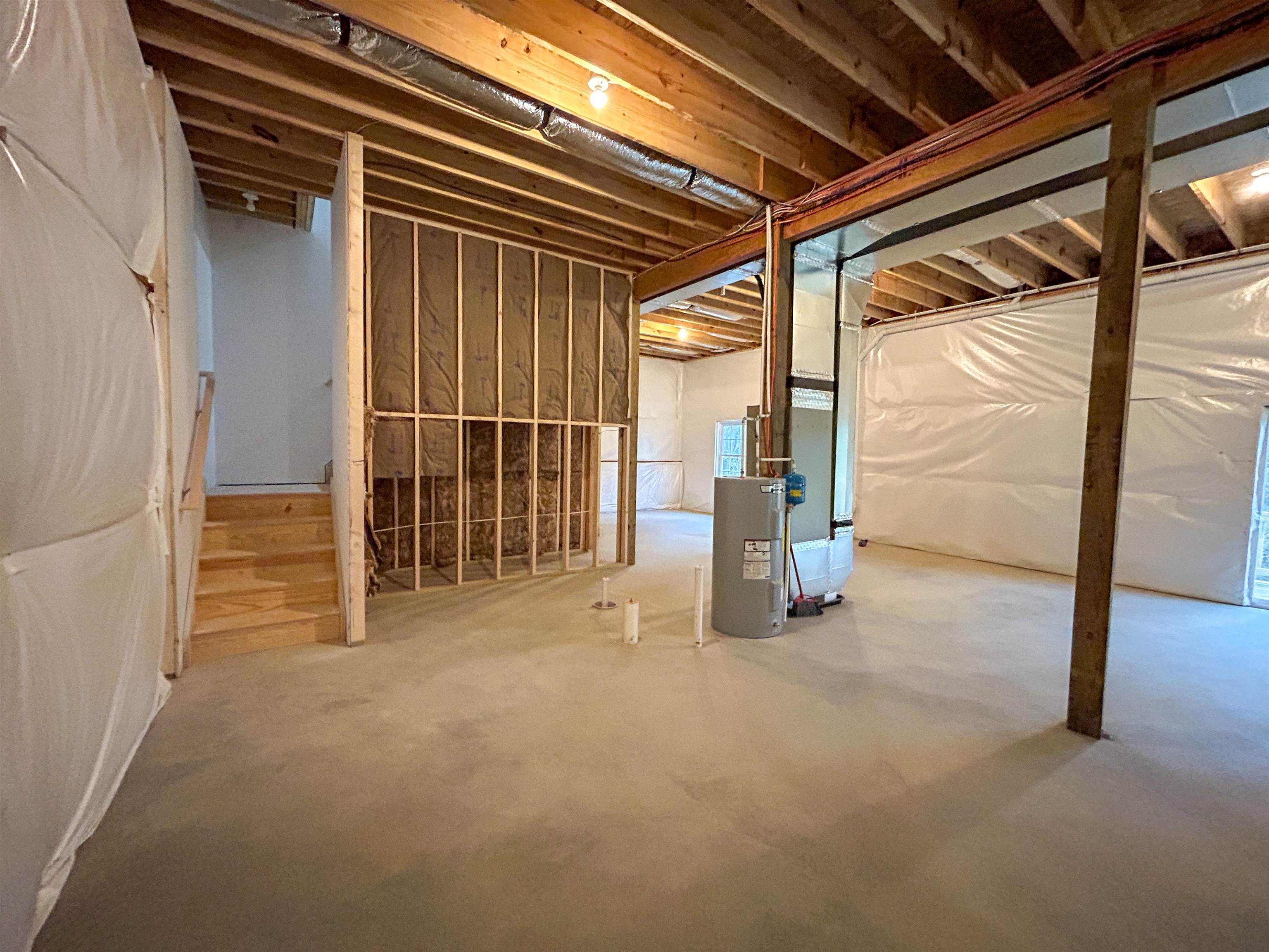 244 Locustdale Loop Shenandoah, VA 22849 - Photo 56 of 74 a view of empty room with wooden floor and floor to ceiling window