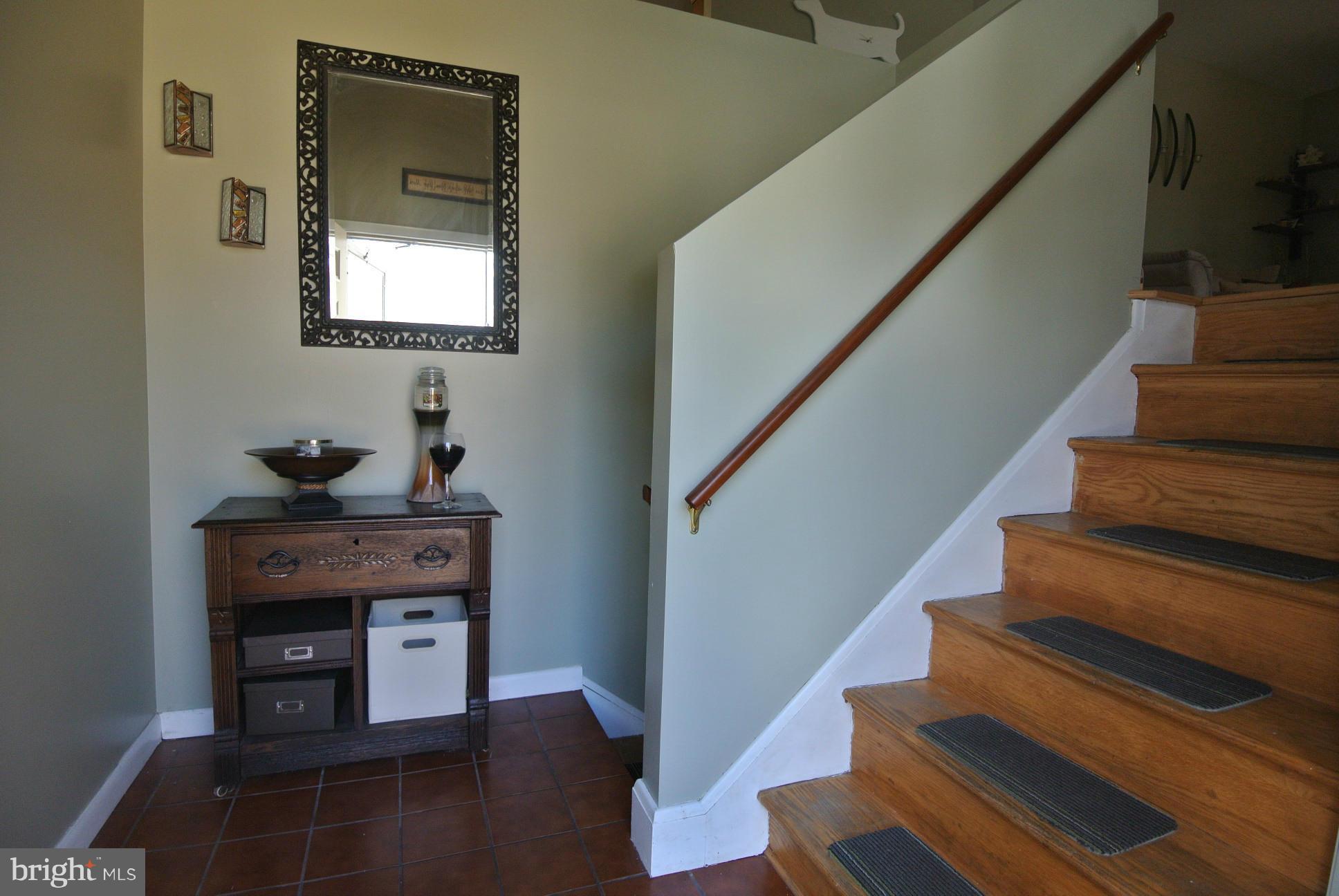 849 Seneca Park Road Baltimore, MD 21220 - Photo 5 of 29 2 Story Foyer with Ceramic Tile and Ceiling Fan