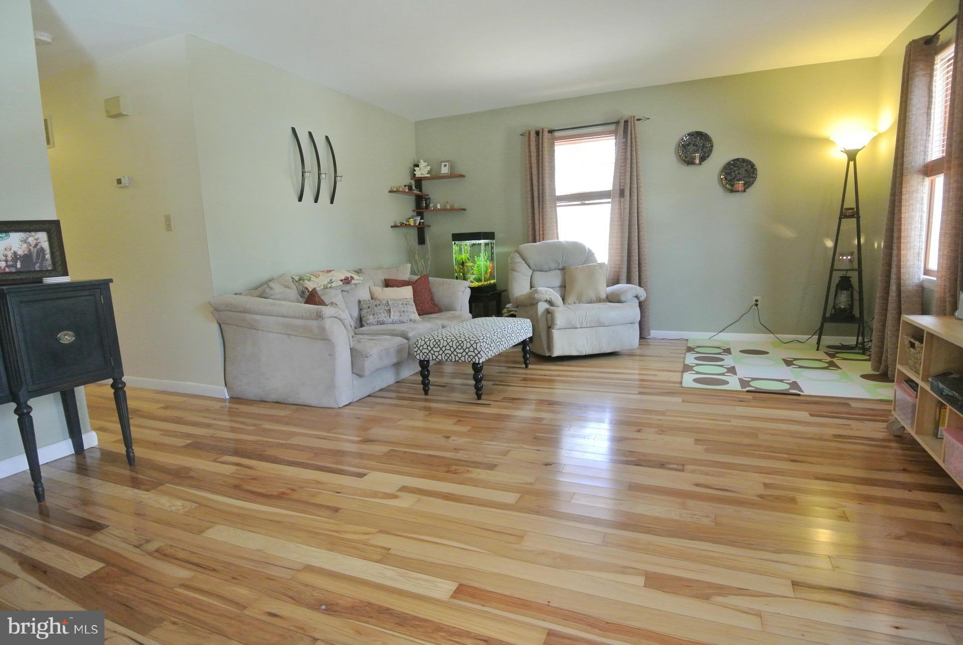 849 Seneca Park Road Baltimore, MD 21220 - Photo 6 of 29 Spacious Living Room wGleaming Hickory Hdwd Floors