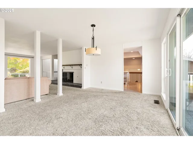 a view of a kitchen with furniture and a kitchen