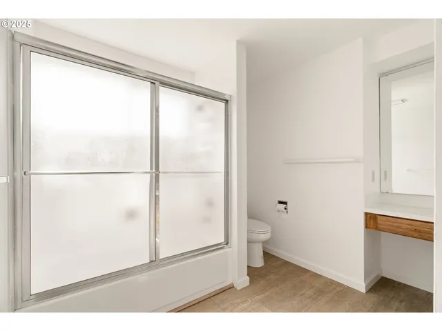 a view of small space with wooden floor