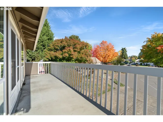 a balcony with an outdoor space