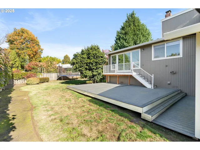 a view of house with yard entertaining space