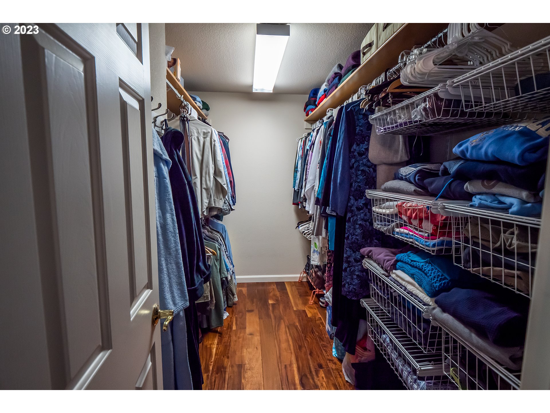 3386 Bentley Avenue Eugene, OR 97405 - Photo 16 of 32 a view of walk in closet with clothes and shoes