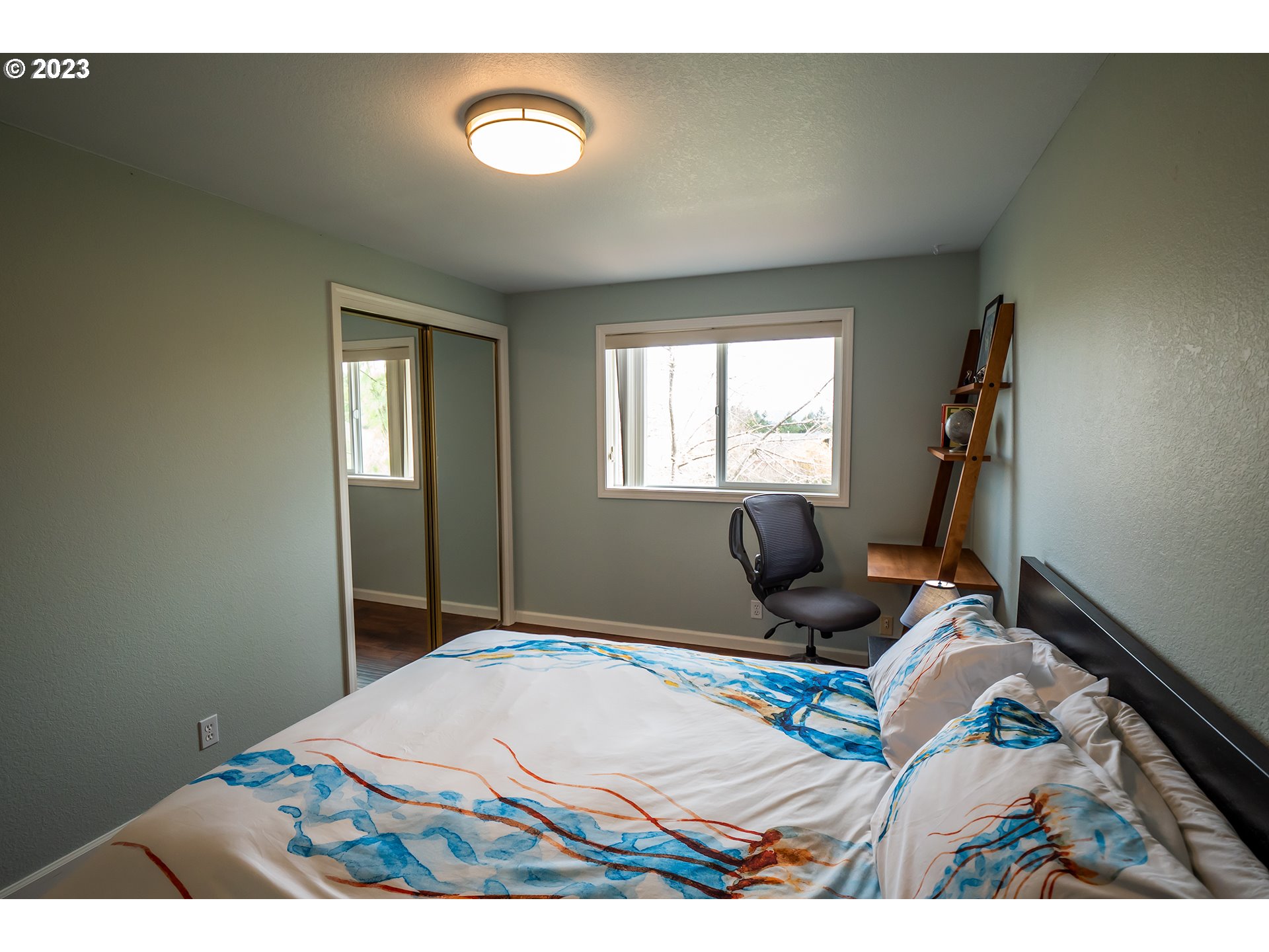 3386 Bentley Avenue Eugene, OR 97405 - Photo 20 of 32 a bedroom with a bed and window