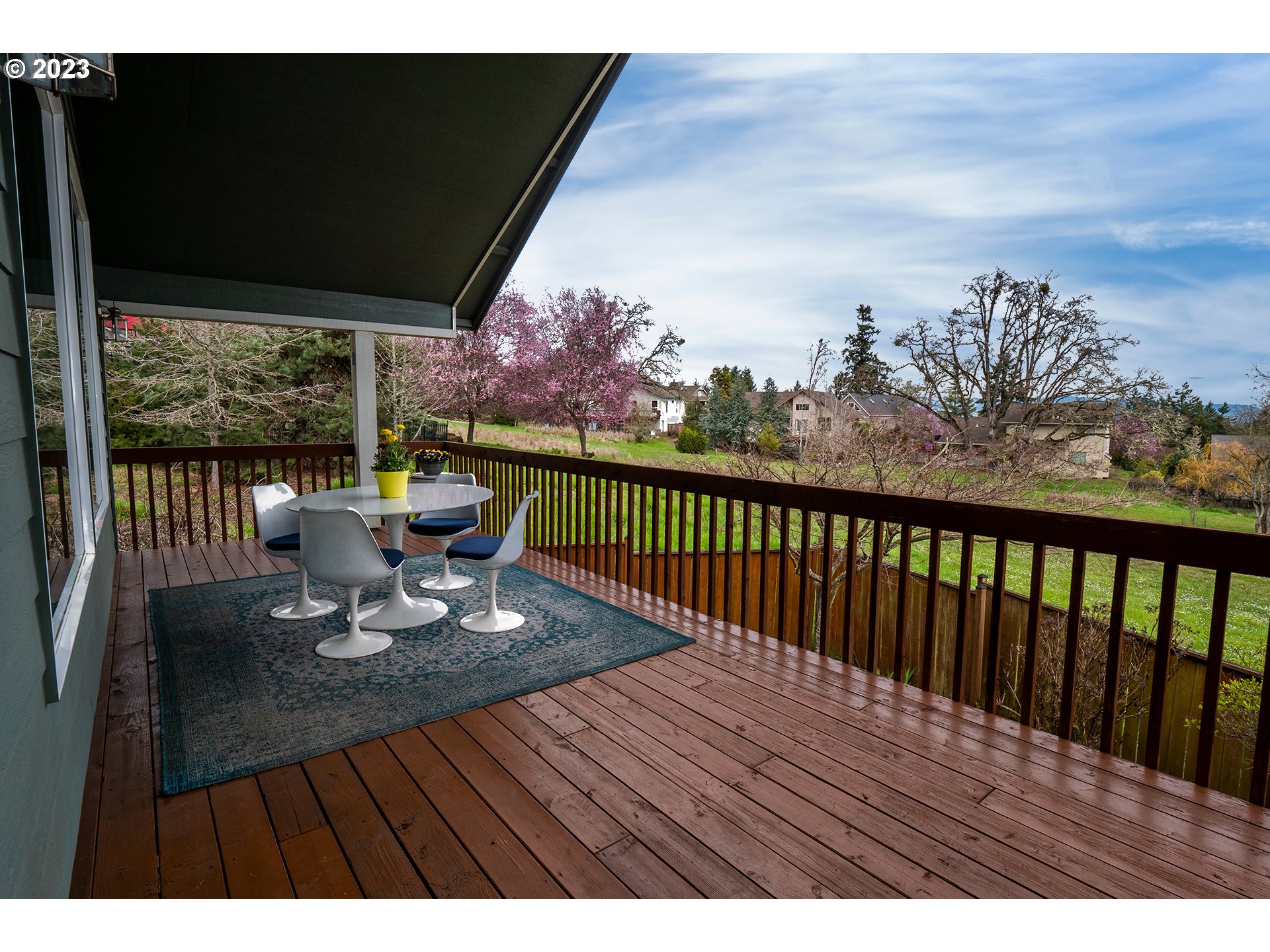 3386 Bentley Avenue Eugene, OR 97405 - Photo 24 of 32 a view of balcony with furniture and wooden floor