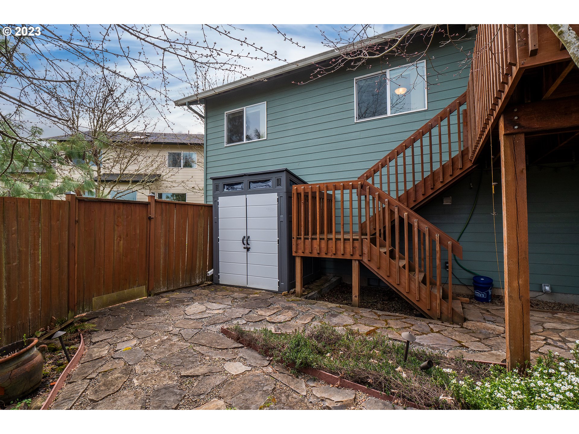 3386 Bentley Avenue Eugene, OR 97405 - Photo 28 of 32 a view of backyard with deck and wooden fence