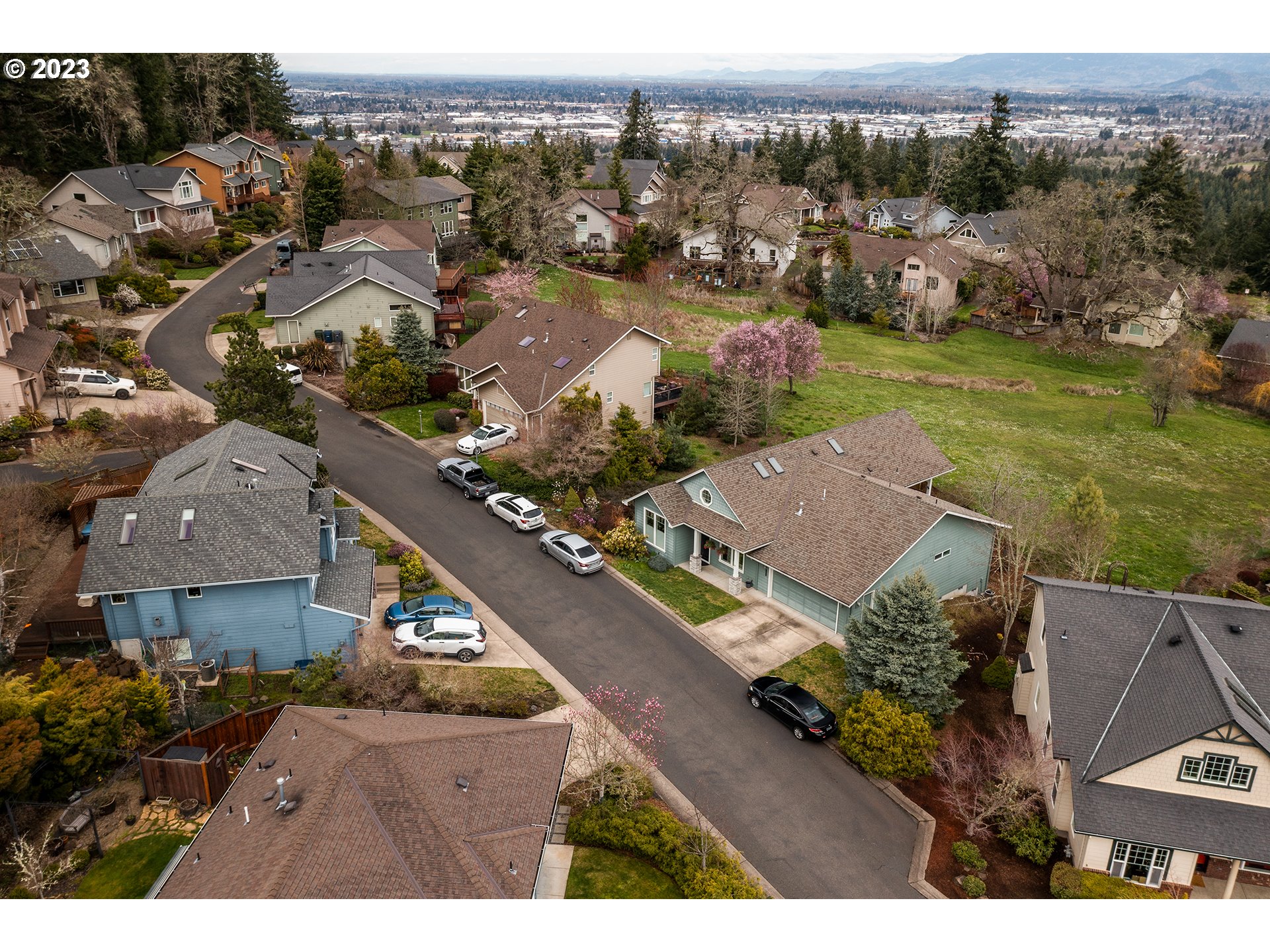 3386 Bentley Avenue Eugene, OR 97405 - Photo 32 of 32 an aerial view of a house with a garden