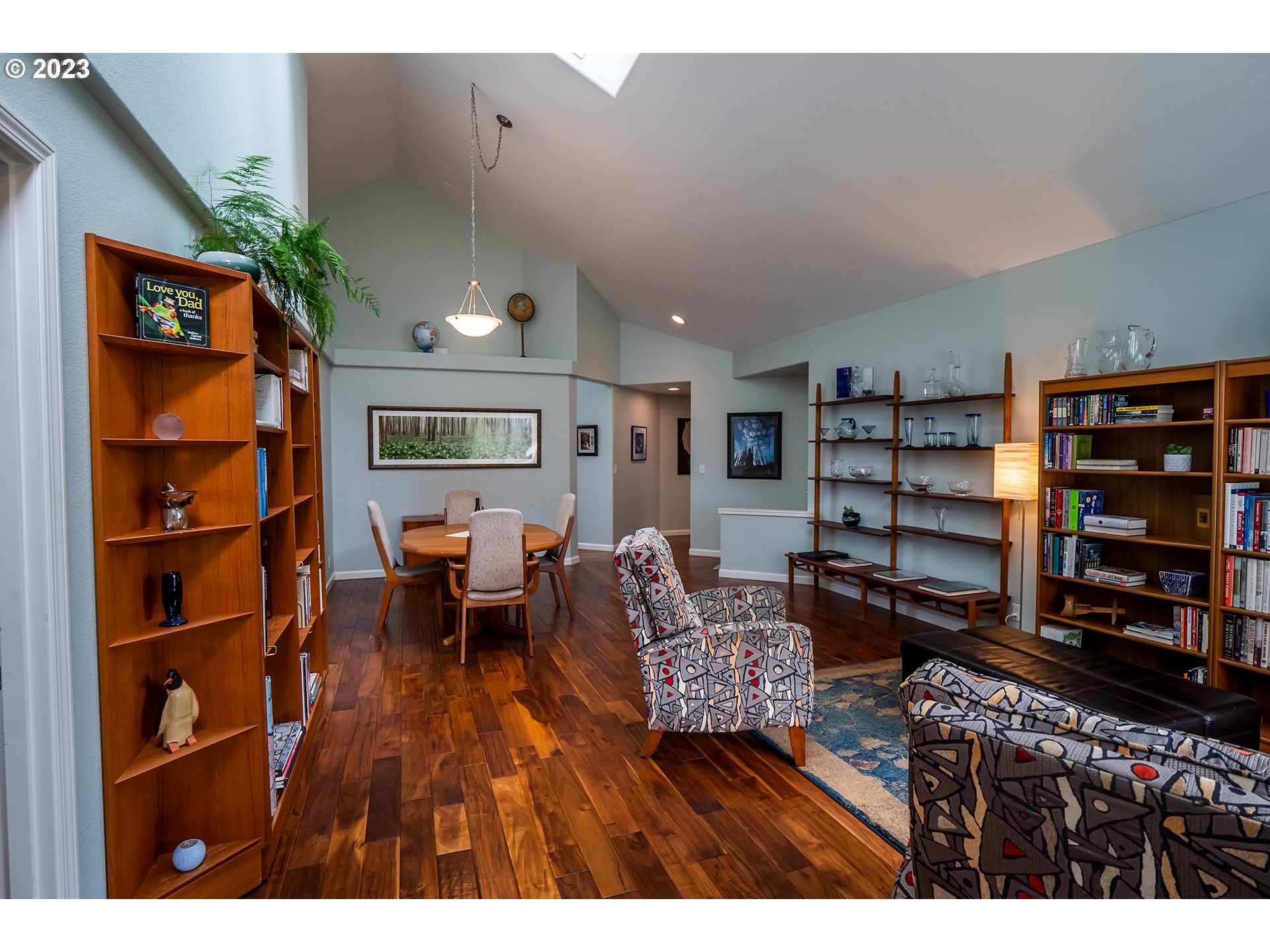3386 Bentley Avenue Eugene, OR 97405 - Photo 7 of 32 a living room with furniture and a book shelf
