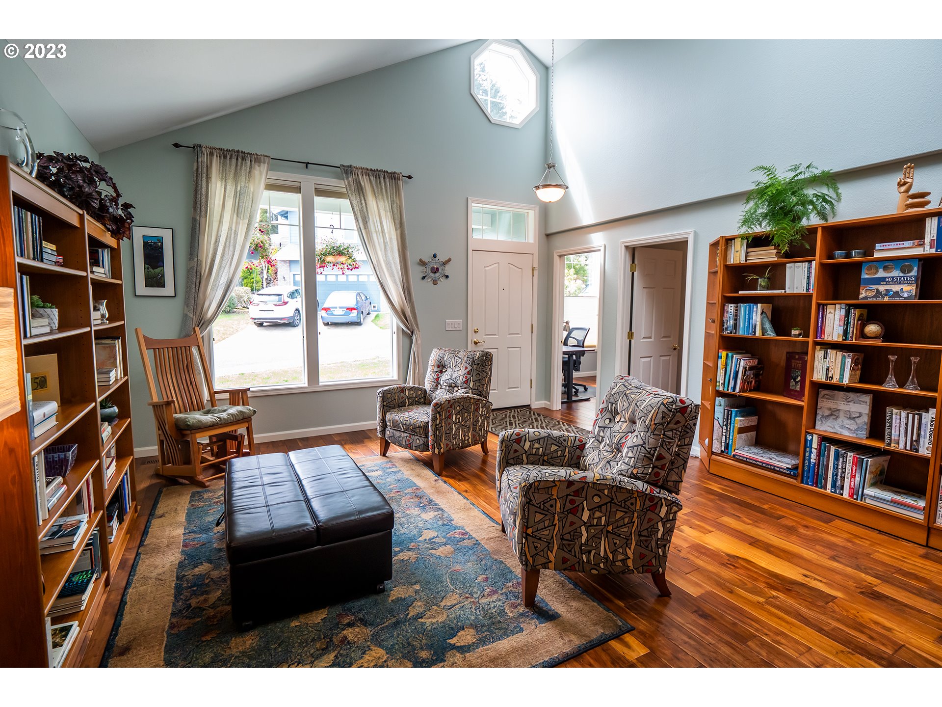 3386 Bentley Avenue Eugene, OR 97405 - Photo 8 of 32 a living room with furniture and a book shelf