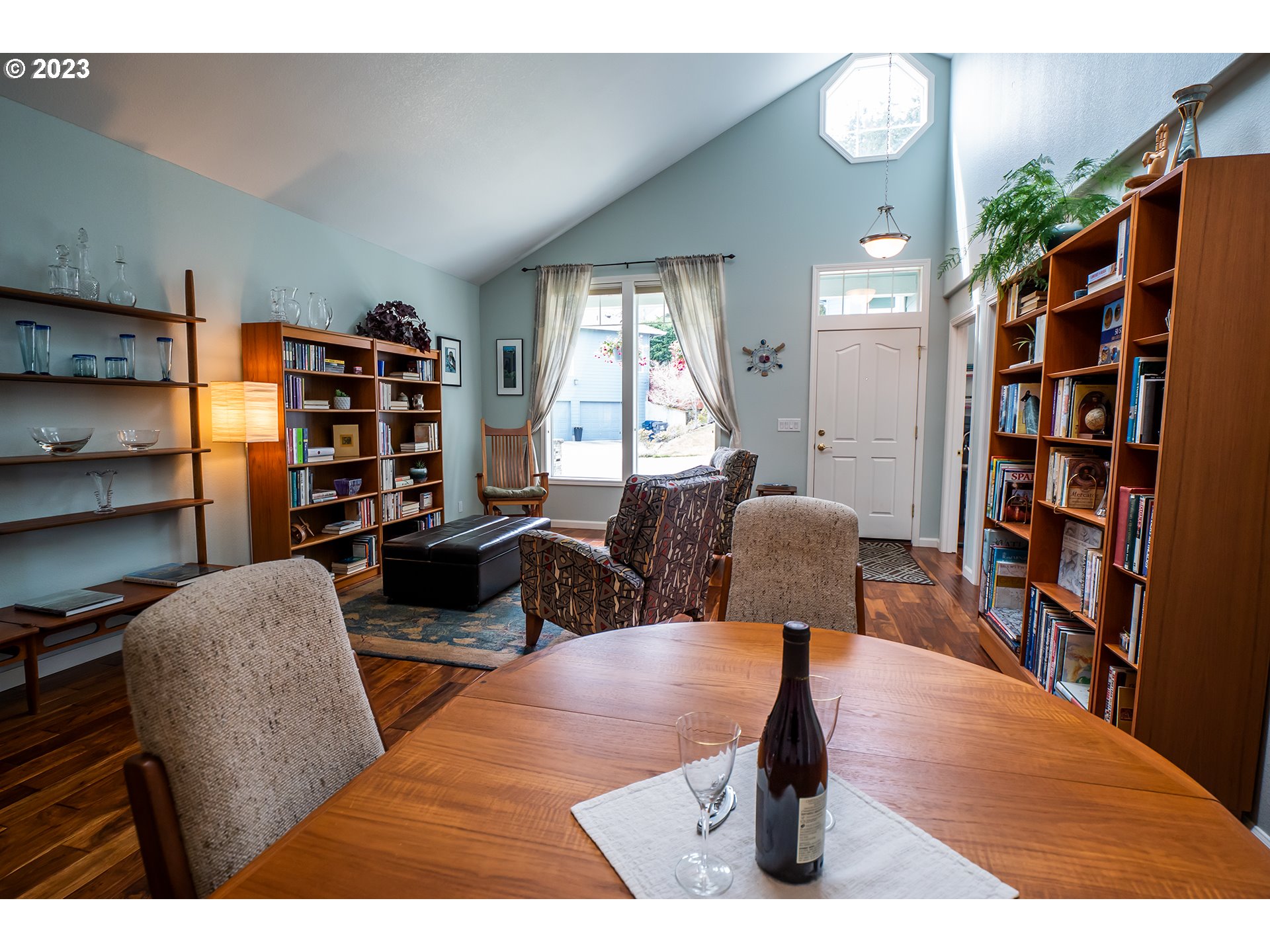 3386 Bentley Avenue Eugene, OR 97405 - Photo 9 of 32 a living room with furniture and a book shelf