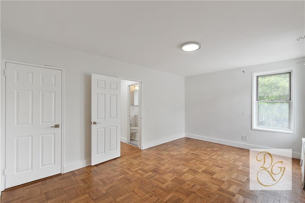 7520 Ridge Boulevard, Unit 1A Brooklyn, NY 11209 - Photo 11 of 18 a view of an empty room with window and closet area