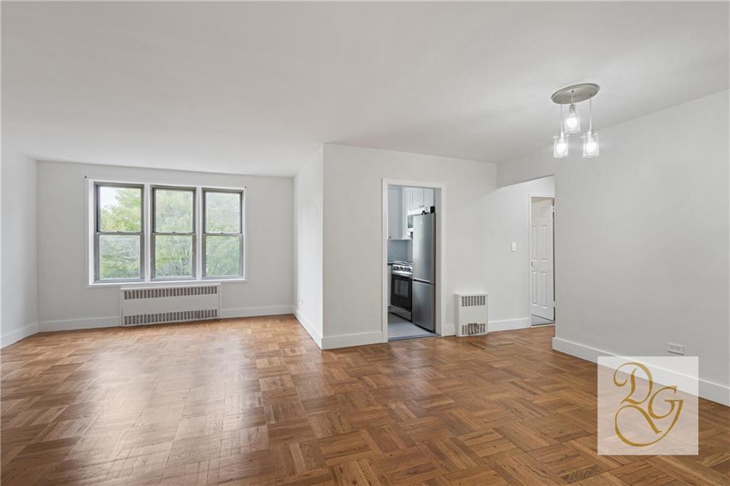 7520 Ridge Boulevard, Unit 1A Brooklyn, NY 11209 - Photo 5 of 18 a view of empty room with floor to ceiling window