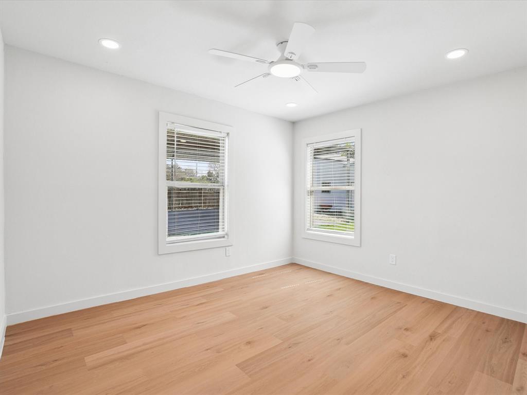 5544 Ranchero Lane Dallas, TX 75236 - Photo 12 of 21 a view of an empty room with a window