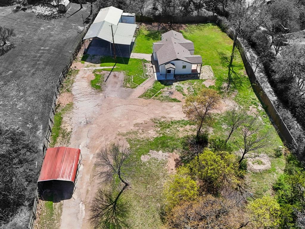 5544 Ranchero Lane Dallas, TX 75236 - Photo 21 of 21 a aerial view of a house with a yard