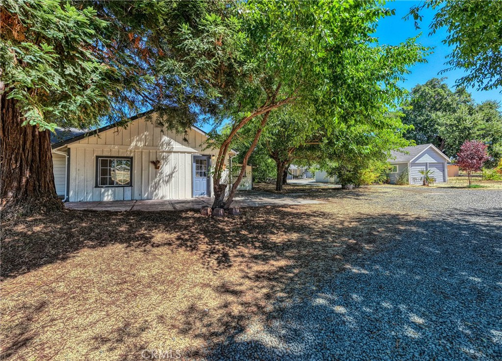 1980 Big Valley Road Lakeport, CA 95453 - Photo 2 of 56 a view of a house with backyard