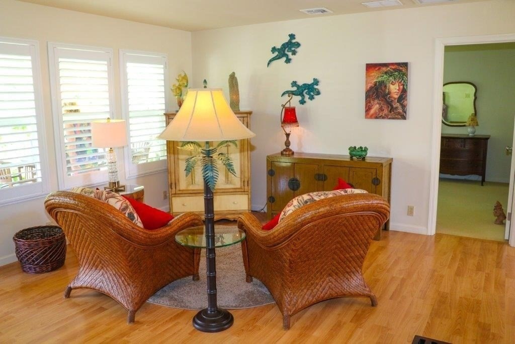 6671 Puupilo Road Kapaa, HI 96746 - Photo 8 of 24 a living room with furniture and a large window