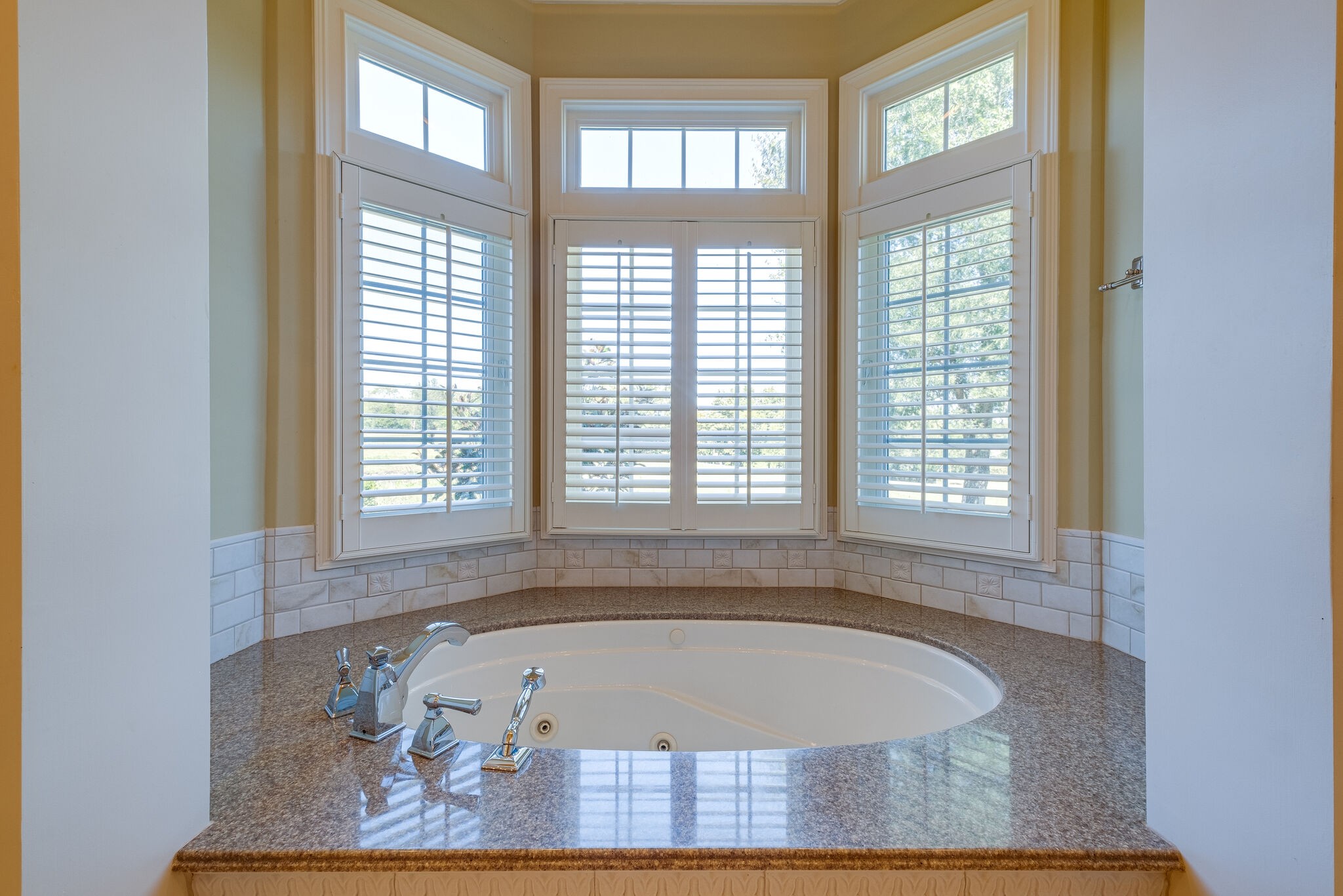 1800 Horn Springs Road Lebanon, TN 37087 - Photo 28 of 56 a bath tub sitting in a bathroom next to a window