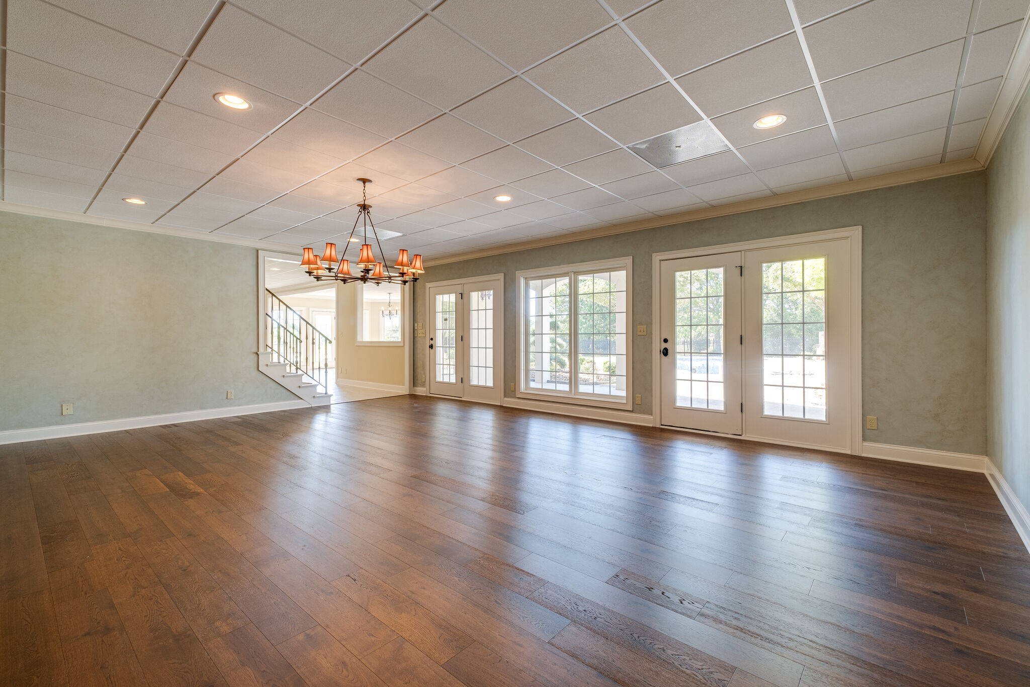 1800 Horn Springs Road Lebanon, TN 37087 - Photo 38 of 56 an empty room with wooden floor and windows