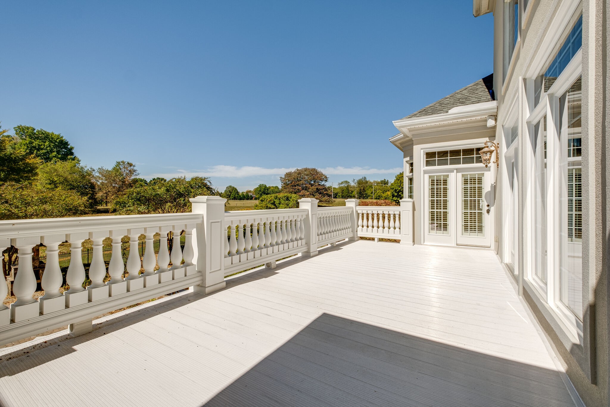 1800 Horn Springs Road Lebanon, TN 37087 - Photo 46 of 56 a view of a balcony with wooden floor and fence