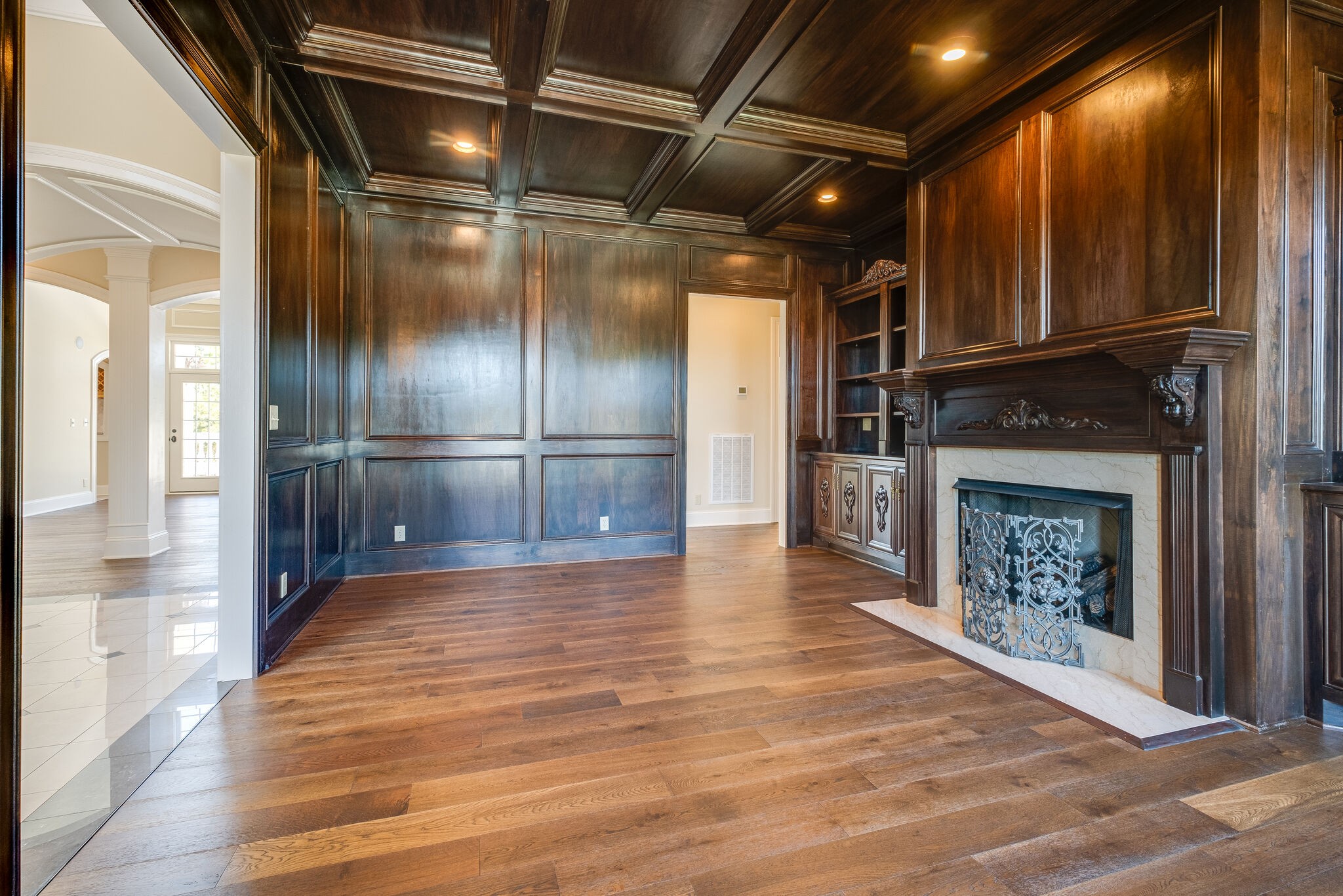 1800 Horn Springs Road Lebanon, TN 37087 - Photo 8 of 56 a view of an empty room with wooden floor and a kitchen