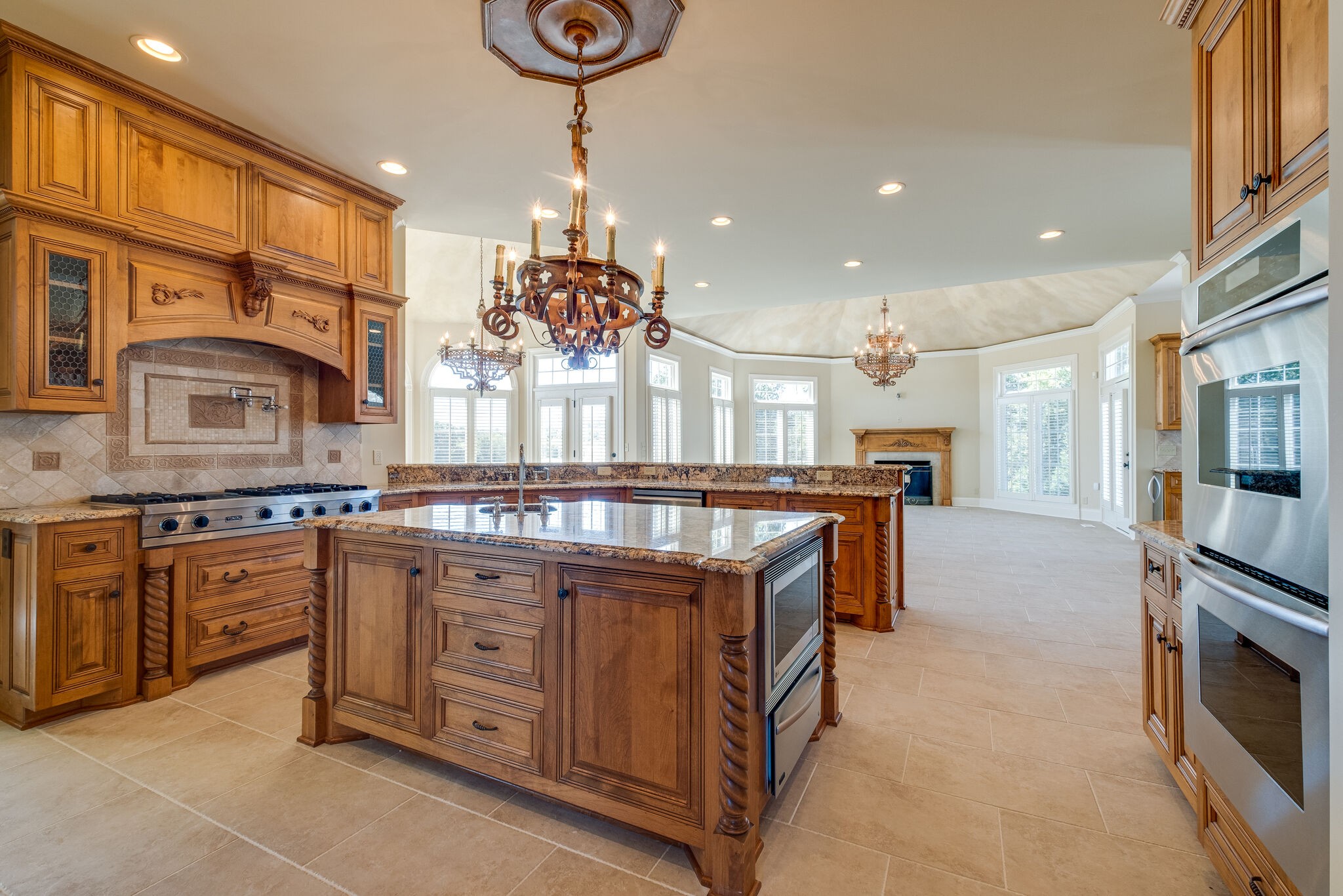 1800 Horn Springs Road Lebanon, TN 37087 - Photo 9 of 56 a large kitchen with stainless steel appliances granite countertop a stove and a sink