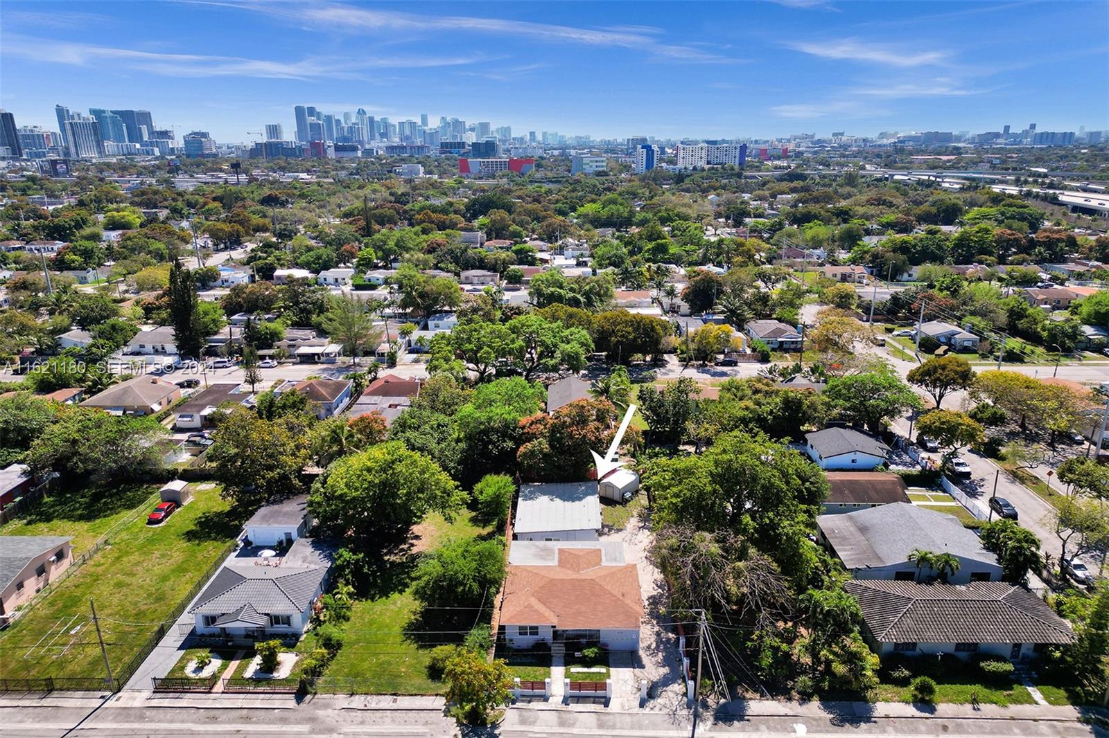 418 Northwest 47th Street Miami, FL 33127 - Photo 4 of 24 an aerial view of multiple house