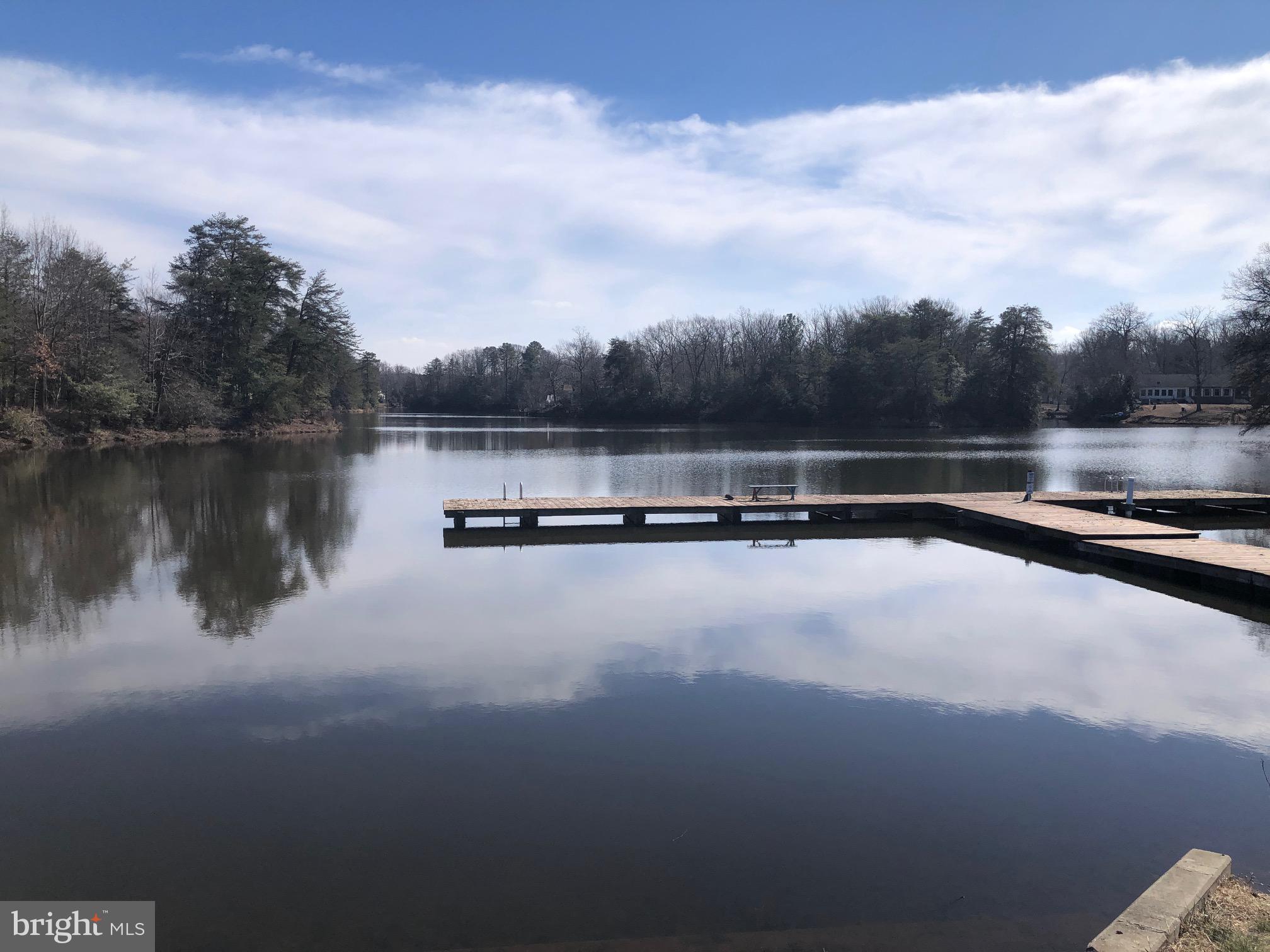Lot 20 Chrystal Road Colonial Beach, VA 22443 - Photo 6 of 8 a view of a lake with a big yard