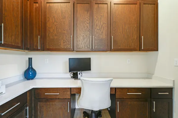 a spacious bathroom with a bathtub and a sink