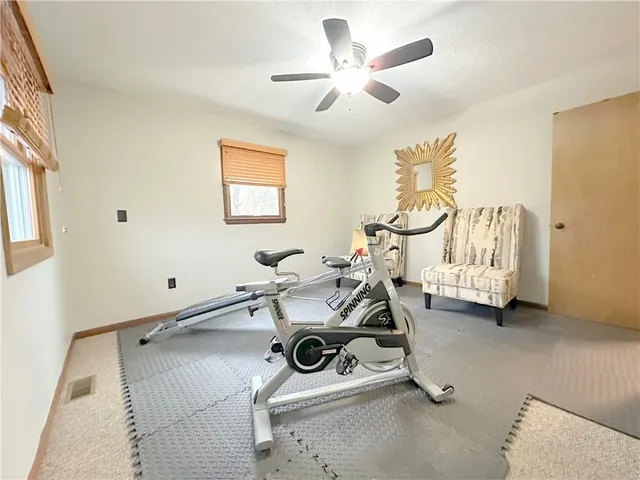 a view of a room with gym equipment