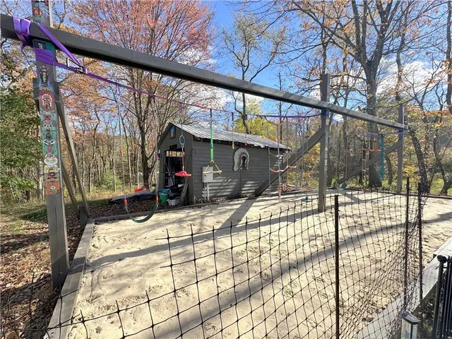 a view of yard with swimming pool