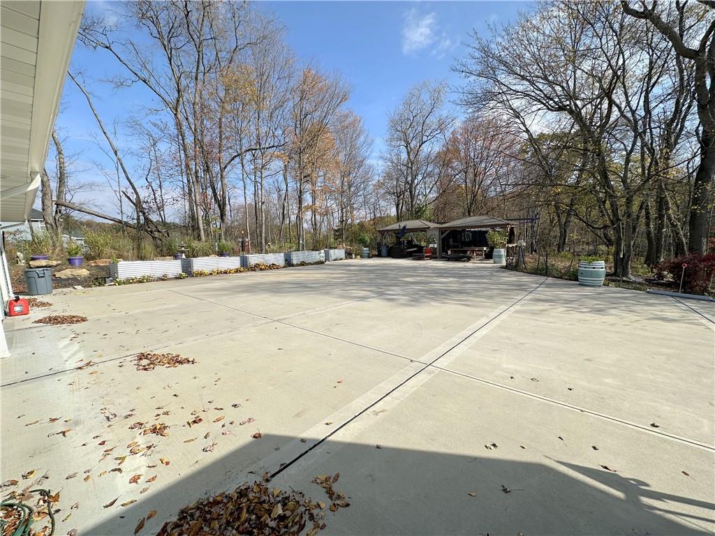 257 Stoup Road Mars, PA 16046 - Photo 5 of 50 a view of a parking space with white house