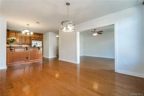 a view of a kitchen with a refrigerator a sink and dishwasher