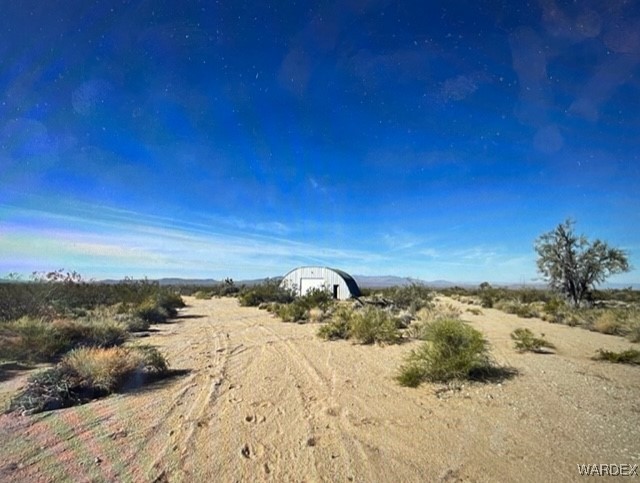 241-17-005 South Horseshoe Road Yucca, AZ 86438 - Photo 2 of 23 a view of ocean with snow
