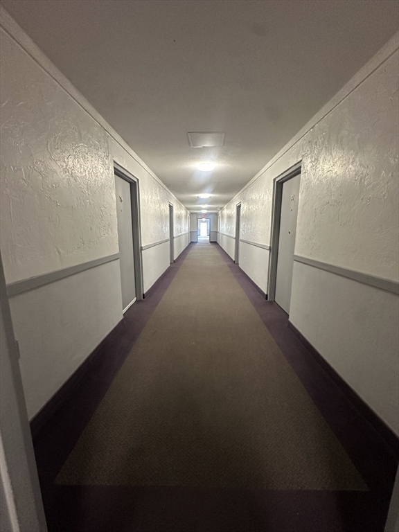 175 Ward Street, Unit 78 Revere, MA 02151 - Photo 15 of 20 a view of a hallway