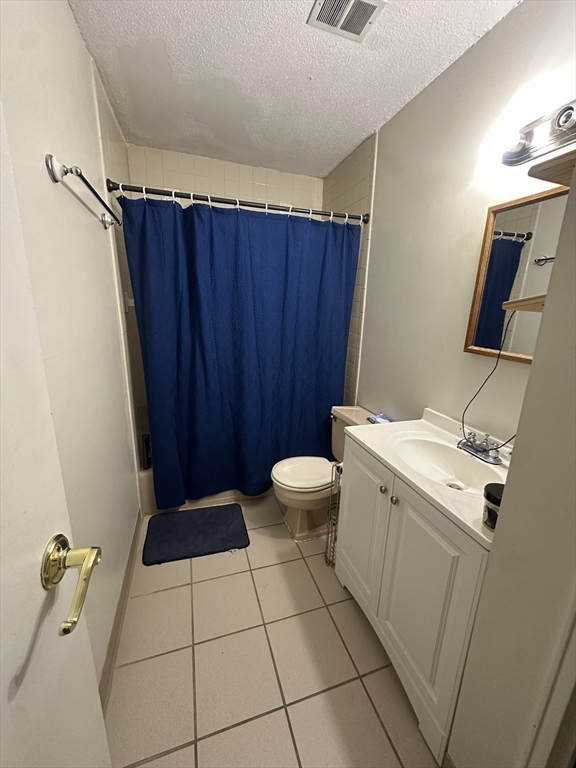 175 Ward Street, Unit 78 Revere, MA 02151 - Photo 8 of 20 a bathroom with a sink toilet and shower