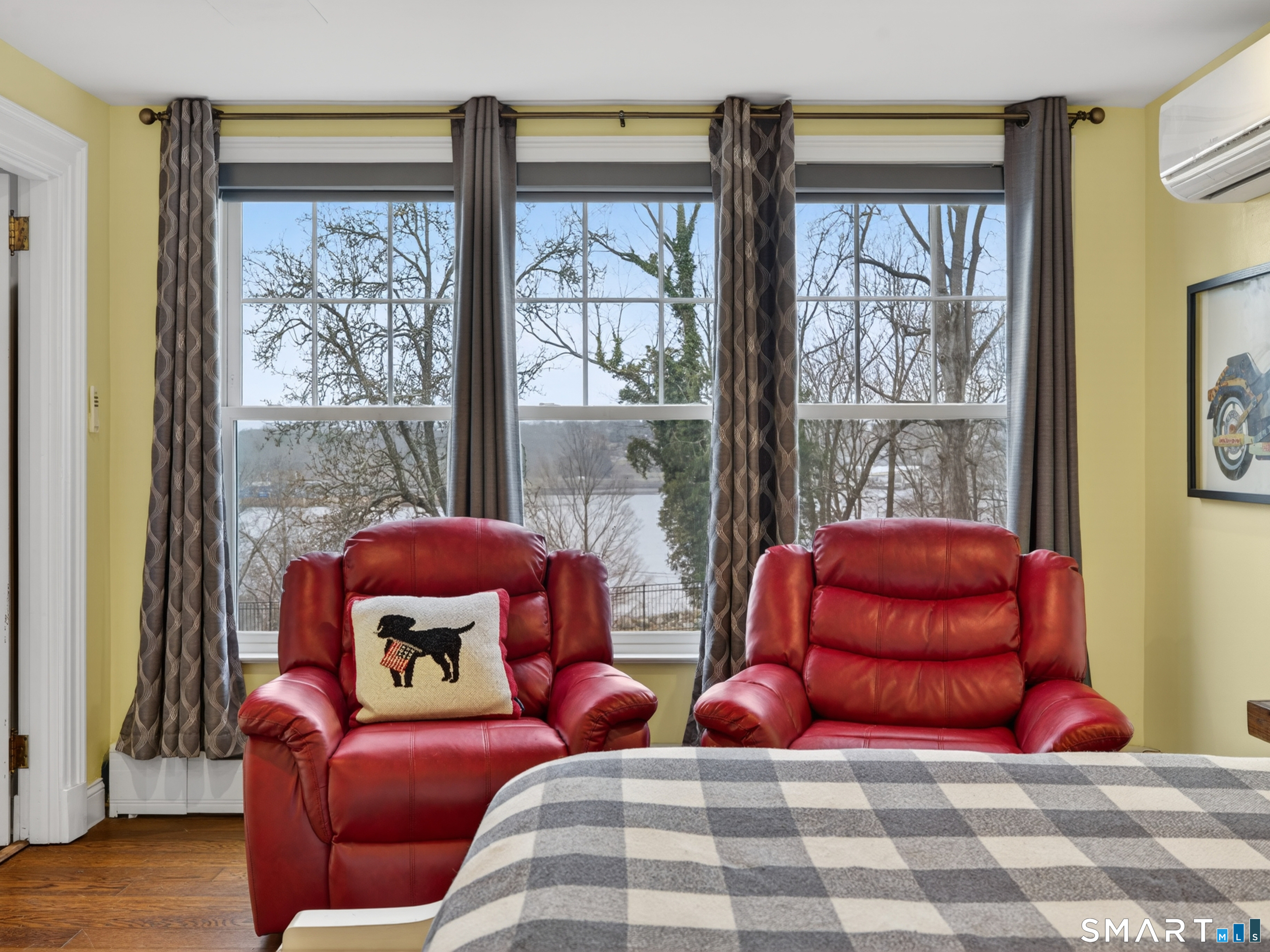 76 Starr Hill Road Groton, CT 06340 - Photo 19 of 40 a bedroom with two beds and a large window