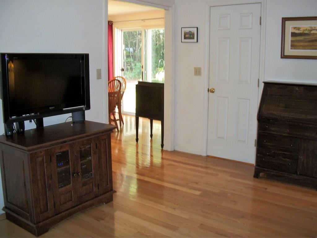 4 Azalea Lane, Unit 2 Windham, ME 04062 - Photo 17 of 33 Large den/bedroom with gleaming...