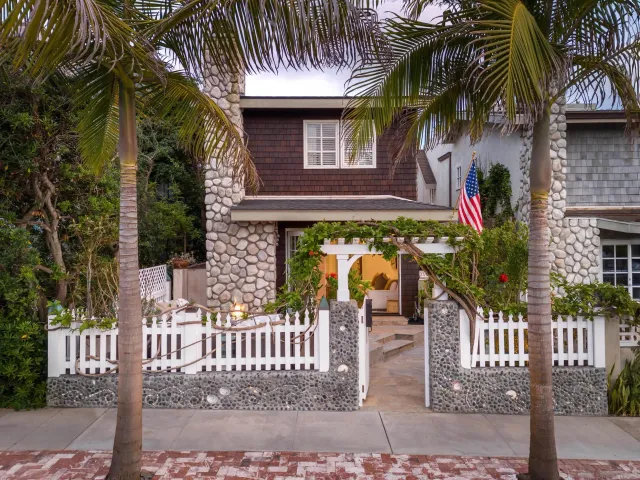 a view of a house with a tree
