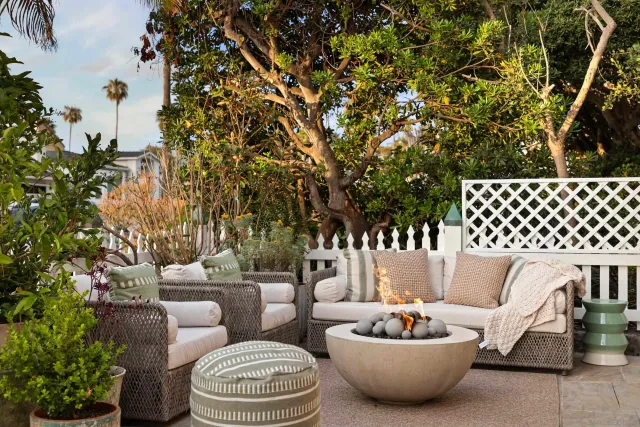 a outdoor living space with furniture and a potted plant