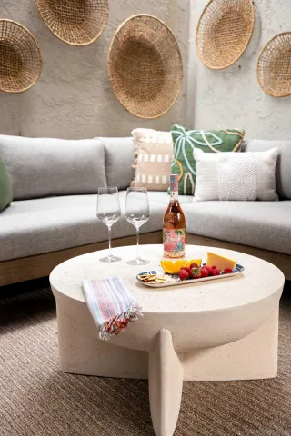 a living room with furniture and a table