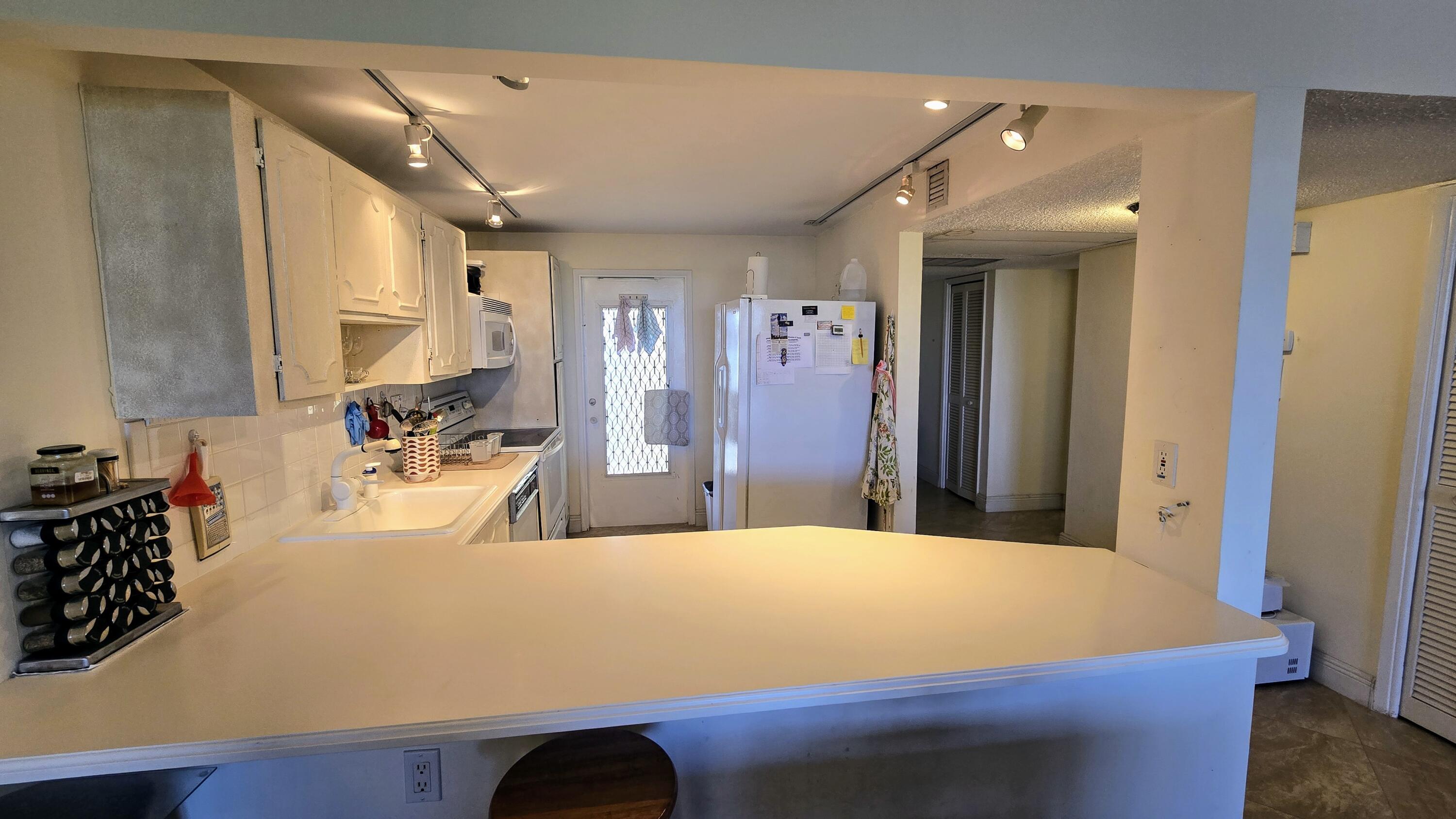 a room with a bed and a large mirror