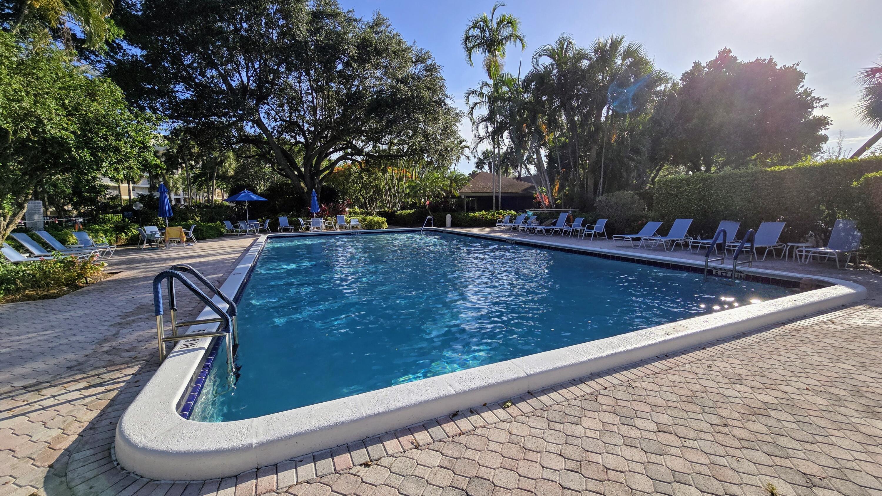 3100 North Course Lane, Unit 410 Pompano Beach, FL 33069 - Photo 22 of 23 a view of swimming pool