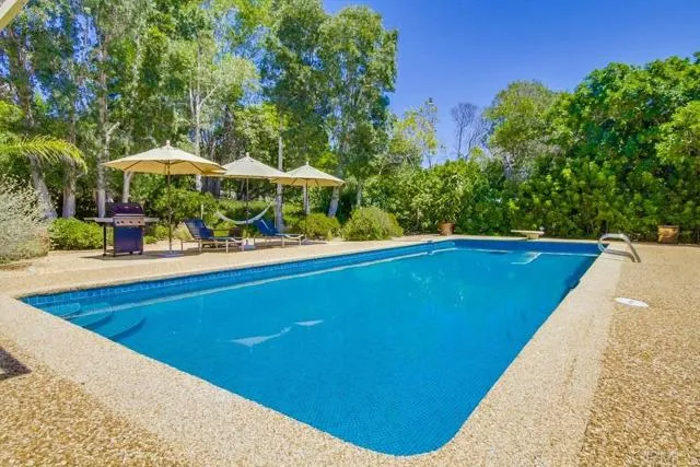17355 Avenida De Acacias Rancho Santa Fe, CA 92067 - Photo 11 of 16 a view of swimming pool with an outdoor seating