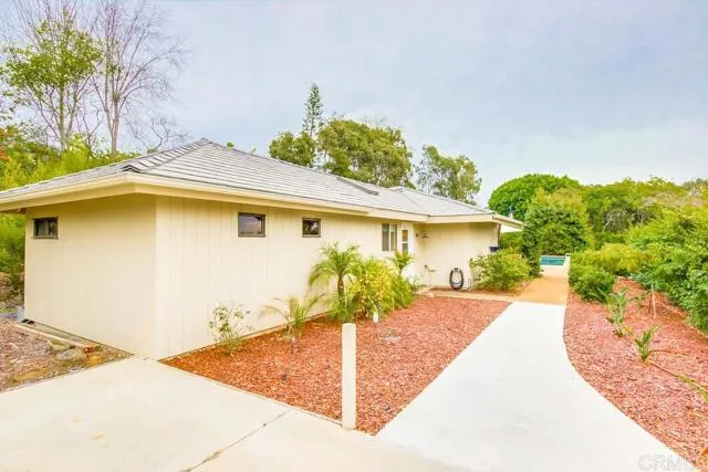 17355 Avenida De Acacias Rancho Santa Fe, CA 92067 - Photo 14 of 16 a view of a house with pool