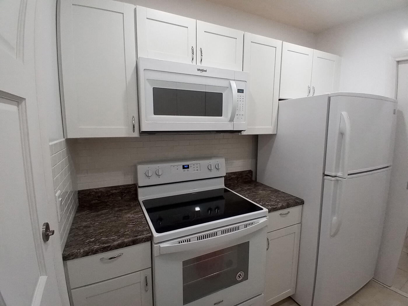 1250 East Sample Road, Unit 303 Pompano Beach, FL 33064 - Photo 7 of 19 Kitchen 01