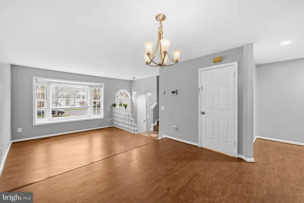 a kitchen with a stove and cabinets